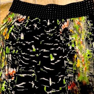 Pleated long sheer lined skirt.